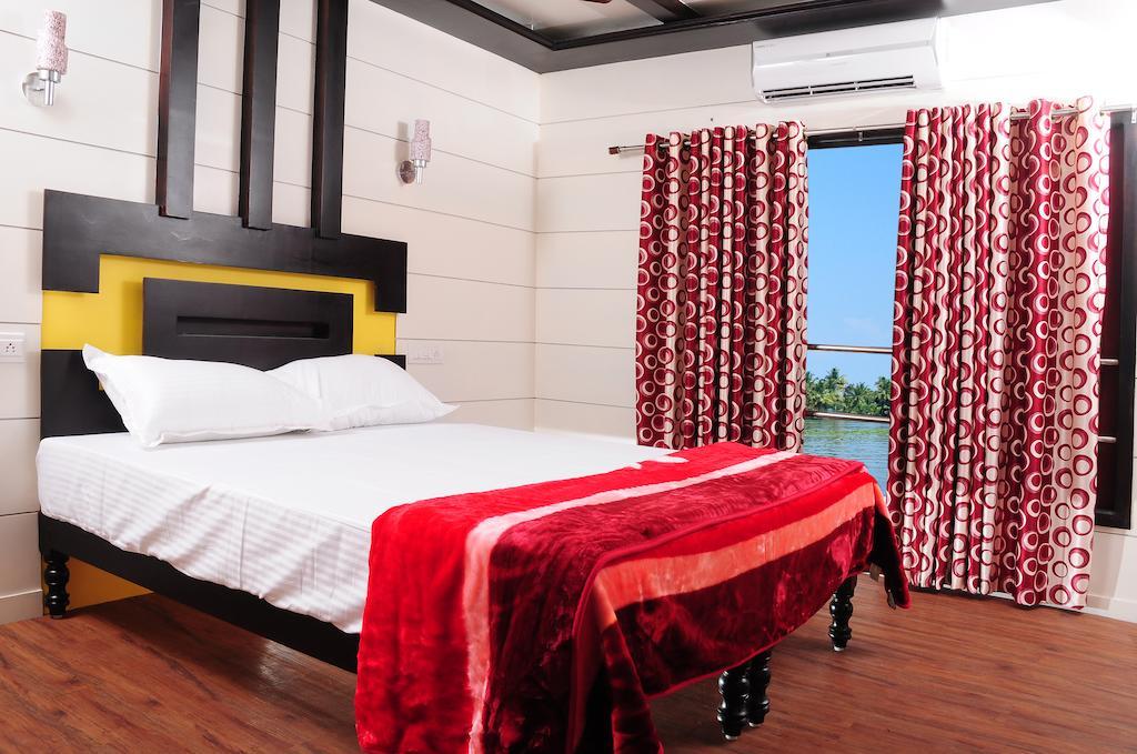 Hotel Vaishnav Tours Alappuzha Pokoj fotografie